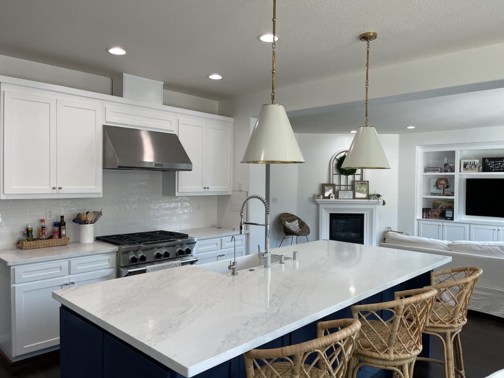 Kitchen remodel with blue island and quartz countertops in Sacramento — Keystone Building Services